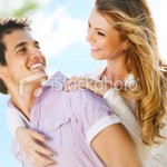 stock-photo-20346435-embraced-couple-enjoying-in-a-sunny-day
